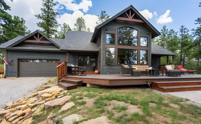 Lemon Lake Log Cabin exterior with mountain backdrop, Durango CO